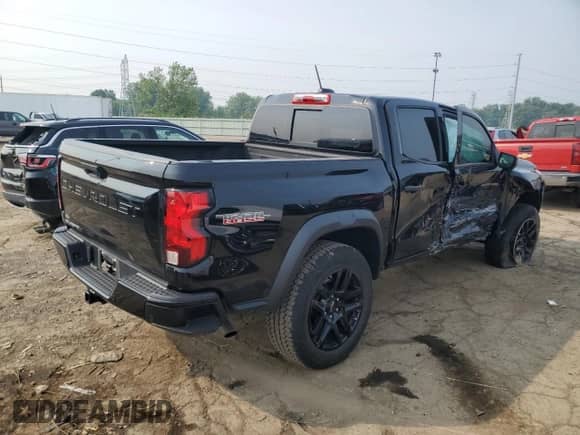2023 Chevrolet Colorado 4WD Trail Boss z VIN 1GCPTEEKXP1123449, wystawiony jako Copart lot #67524375 z przebiegiem 50 802 mil mil oraz Nie do naprawy • Non repairable. Historia ofert i sprzedaży dostępna na DreamBid. Obrazek 3.