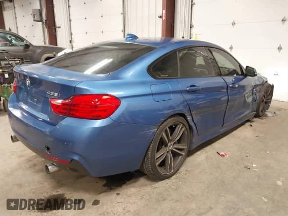 2015 BMW 4 Series 435i xDrive z VIN WBA4B3C52FD670264, wystawiony jako IAAI lot #41391128 z przebiegiem 106 051 mil mil oraz . Historia ofert i sprzedaży dostępna na DreamBid. Obrazek 4.