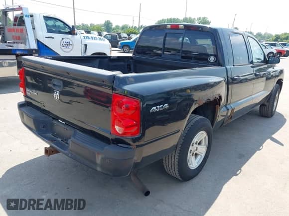 2008 Dodge Dakota SLT with VIN 1D7HW48K78S593988, listed as a IAAI auction lot 42825788 with 216,208 mi miles and . Bid and sale history available at DreamBid. Image 4.