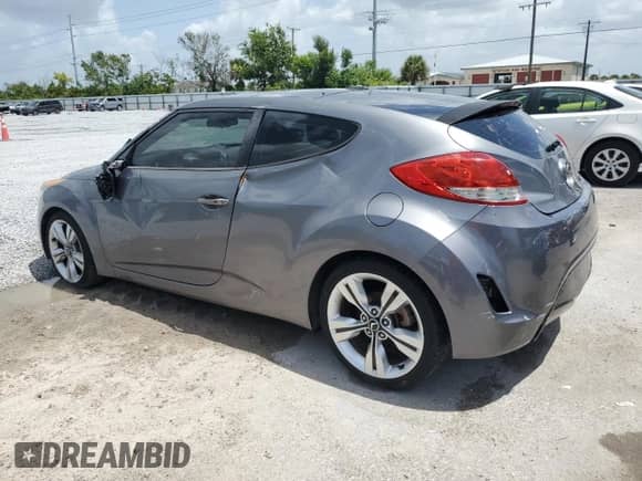 2012 Hyundai Veloster w/Black Int z VIN KMHTC6AD2CU032661, wystawiony jako Copart lot #64272815 z przebiegiem 71 216 mil mil oraz Szkoda całkowita • Salvage title. Historia ofert i sprzedaży dostępna na DreamBid. Obrazek 2.