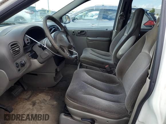 2002 Dodge Caravan SE with VIN 1B4GP253X2B700511, listed as a Copart auction lot 65169105 with 100,394 mi miles and Clean title. Bid and sale history available at DreamBid. Image 7.