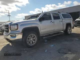 2018 GMC Sierra 1500 SLT z VIN 3GTU2NEC4JG550424, wystawiony jako Copart lot #82081795 z przebiegiem 61 580 mil mil oraz Szkoda całkowita • Salvage title. Historia ofert i sprzedaży dostępna na DreamBid. Obrazek 1.