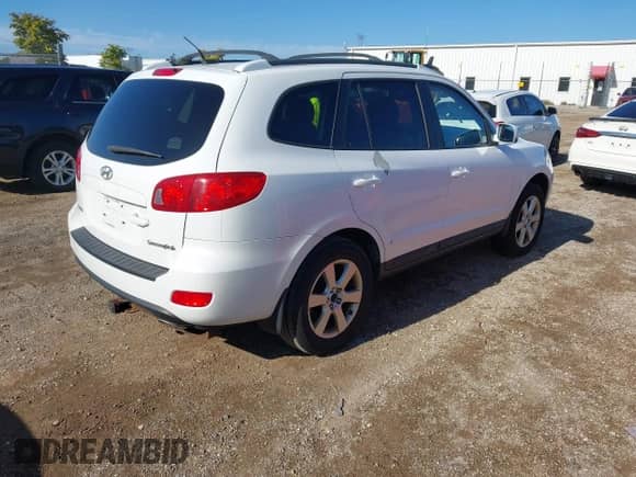 2009 Hyundai Santa Fe SE with VIN 5NMSH13E79H255563, listed as a IAAI auction lot 43142076 with 195,510 mi miles and . Bid and sale history available at DreamBid. Image 4.
