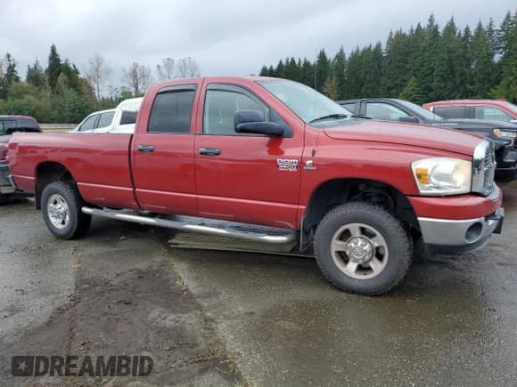 2009 Dodge 3500 SLT with VIN 3D7MX38L99G527241, listed as a Copart auction lot 73479904 with 137,564 mi miles and Salvage title. Bid and sale history available at DreamBid. Image 4.