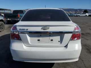 2009 Chevrolet Aveo LS z VIN KL1TD56E59B624886, wystawiony jako Copart lot #81379544 z przebiegiem Nie podano mil oraz Szkoda całkowita • Salvage title. Historia ofert i sprzedaży dostępna na DreamBid. Obrazek 6.