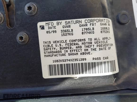 1999 Saturn SL z VIN 1G8ZK5274XZ351289, wystawiony jako IAAI lot #41734679 z przebiegiem 140 006 mil mil oraz . Historia ofert i sprzedaży dostępna na DreamBid. Obrazek 9.