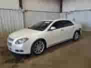 2011 Chevrolet Malibu LTZ with VIN 1G1ZE5E10BF185442, listed as a Copart auction lot 80897835 with 112,488 mi miles and Salvage title. Bid and sale history available at DreamBid. Image 1.