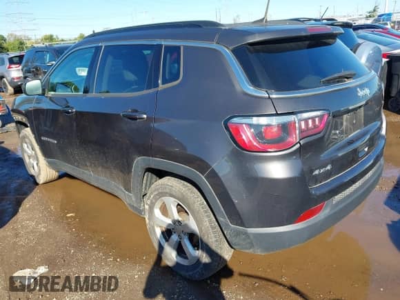 2018 Jeep Compass Latitude with VIN 3C4NJDBB6JT192392, listed as a IAAI auction lot 43397736 with 64,955 mi miles and . Bid and sale history available at DreamBid. Image 3.