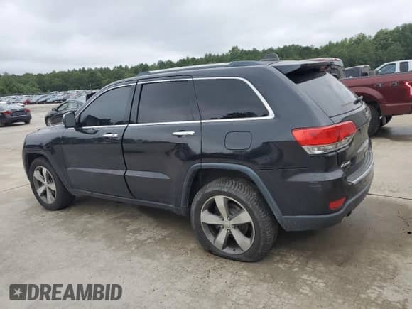 2014 Jeep Grand Cherokee Limited z VIN 1C4RJFBG1EC534664, wystawiony jako Copart lot #69820215 z przebiegiem 120 688 mil mil oraz Szkoda całkowita • Salvage title. Historia ofert i sprzedaży dostępna na DreamBid. Obrazek 2.