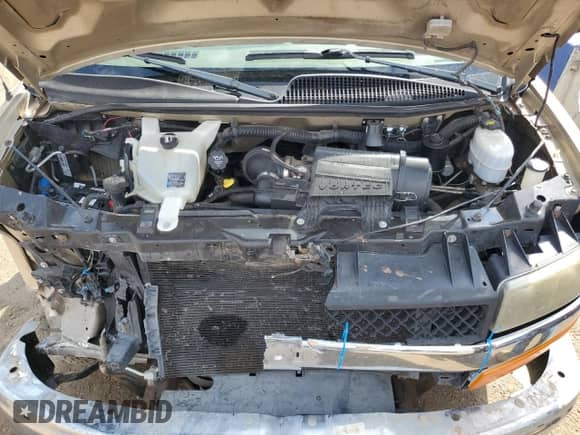 2009 Chevrolet Express Passenger с VIN 1GAHG39K691162400, выставлен на аукционе Copart как лот 69941455 с пробегом 93 557 миль миль и Списание • Salvage title. История ставок и продаж доступна на DreamBid. Изображение 12.