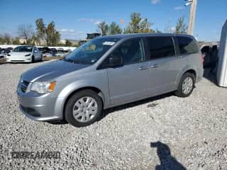 2018 Dodge Grand Caravan SE with VIN 2C4RDGBG5JR137456, listed as a Copart auction lot 82612385 with 304,124 mi miles and Clean title. Bid and sale history available at DreamBid. Image 1.