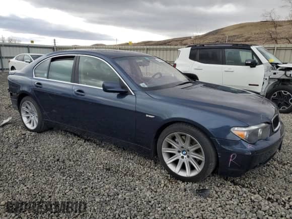 2003 BMW 7 Series 745i with VIN WBAGL63443DP62958, listed as a Copart auction lot 43346805 with 76,468 mi miles and Salvage title. Bid and sale history available at DreamBid. Image 4.