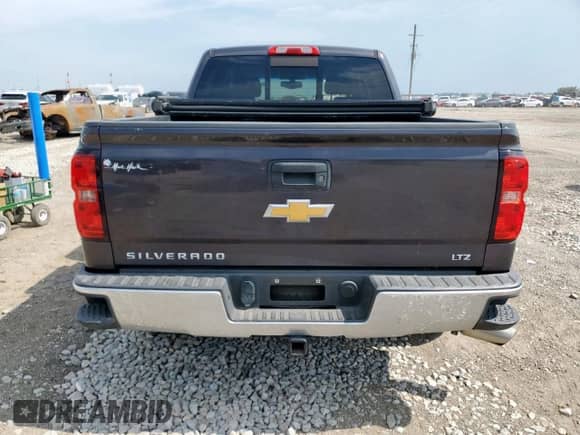 2014 Chevrolet Silverado 1500 LTZ с VIN 3GCPCSEC4EG448796, выставлен на аукционе Copart как лот 69520865 с пробегом 195 887 миль миль и Списание • Salvage title. История ставок и продаж доступна на DreamBid. Изображение 6.