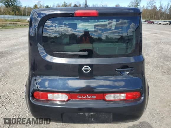 2010 Nissan Cube S with VIN JN8AZ2KR3AT170729, listed as a Copart auction lot 82282885 with 97,111 mi miles and Salvage title. Bid and sale history available at DreamBid. Image 6.