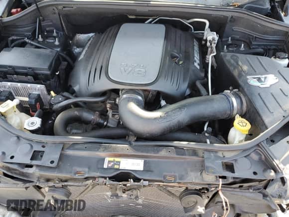 2014 Dodge Durango R/T with VIN 1C4SDJCT8EC307625, listed as a Copart auction lot 71590915 with 178,083 mi miles and Salvage title. Bid and sale history available at DreamBid. Image 12.