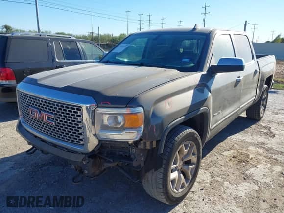 2015 GMC Sierra 1500 Denali with VIN 3GTU2WEC0FG107166, listed as a IAAI auction lot 43572747 with 159,189 mi miles and . Bid and sale history available at DreamBid. Image 2.