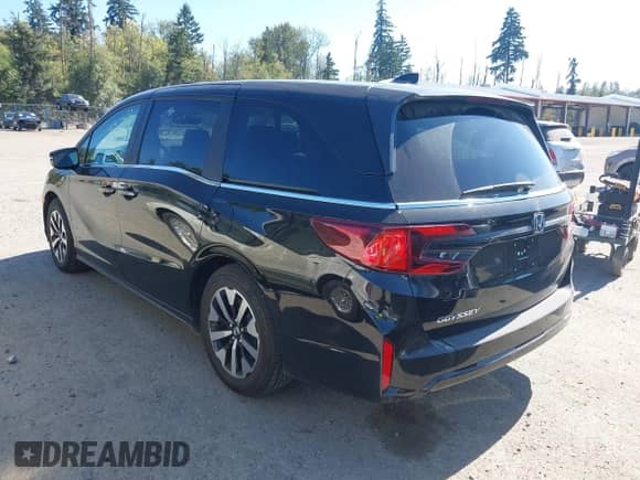 2025 Honda Odyssey EX-L with VIN 5FNRL6H69SB073219, listed as a IAAI auction lot 43217213 with 5,328 mi miles and . Bid and sale history available at DreamBid. Image 3.