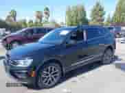 2021 Volkswagen Tiguan SE with VIN 3VV3B7AX4MM127236, listed as a IAAI auction lot 43100517 with 48,229 mi miles and . Bid and sale history available at DreamBid. Image 6.