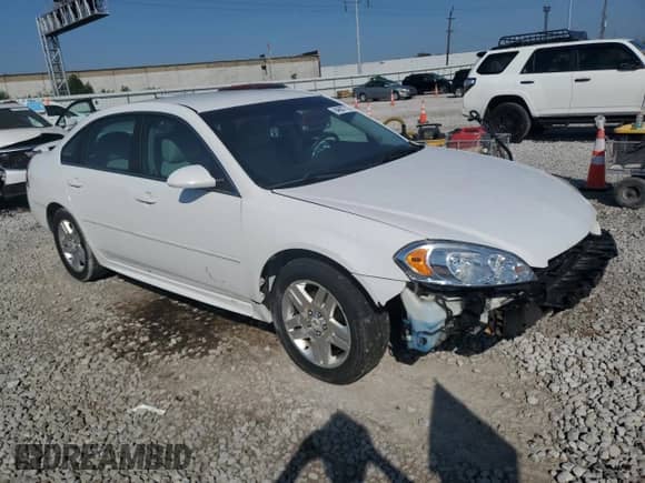 2013 Chevrolet Impala LT с VIN 2G1WB5E32D1112323, выставлен на аукционе Copart как лот 84607715 с пробегом 99 309 миль миль и Списание • Salvage title. История ставок и продаж доступна на DreamBid. Изображение 4.