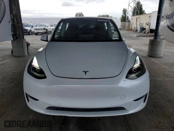 2022 Tesla Model Y Performance с VIN 7SAYGDEF0NF487098, выставлен на аукционе Copart как лот 80744715 с пробегом 39 557 миль миль и Списание • Salvage title. История ставок и продаж доступна на DreamBid. Изображение 5.