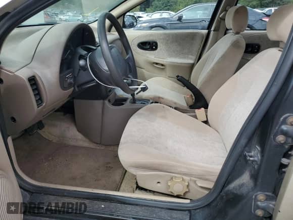 1999 Saturn SL z VIN 1G8ZK5275XZ374919, wystawiony jako Copart lot #68739205 z przebiegiem Nie podano mil oraz Czysty tytuł • Clean title. Historia ofert i sprzedaży dostępna na DreamBid. Obrazek 7.