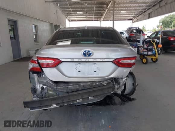 2020 Toyota Camry Hybrid XLE z VIN 4T1F31AK1LU533605, wystawiony jako IAAI lot #42790450 z przebiegiem 98 102 mil mil oraz . Historia ofert i sprzedaży dostępna na DreamBid. Obrazek 17.