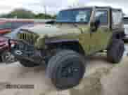 2013 Jeep Wrangler Rubicon with VIN 1C4HJWCG1DL574039, listed as a Copart auction lot 48728645 with 116,537 mi miles and Salvage title. Bid and sale history available at DreamBid. Image 1.