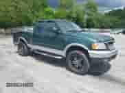 1999 Ford F-150 z VIN 1FTRX18W8XNB82710, wystawiony jako Copart lot #58264745 z przebiegiem Nie podano mil oraz Szkoda całkowita • Salvage title. Historia ofert i sprzedaży dostępna na DreamBid. Obrazek 4.