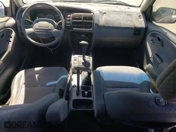 2002 Chevrolet Tracker с VIN 2CNBJ13C026951435, выставлен на аукционе Copart как лот 57782784 с пробегом 132 279 миль миль и Списание • Salvage title. История ставок и продаж доступна на DreamBid. Изображение 8.