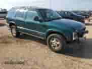 1996 Chevrolet Blazer with VIN 1GNDT13W3T2262402, listed as a Copart auction lot 62677515 with 168,312 mi miles and Salvage title. Bid and sale history available at DreamBid. Image 4.