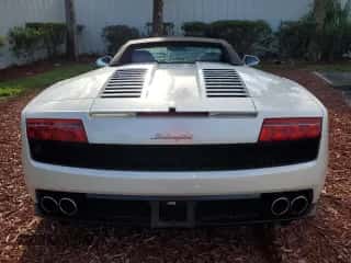 2012 Lamborghini Gallardo с VIN ZHWGU6BZ7CLA11933, выставлен на аукционе Copart как лот 74679154 с пробегом Не указан миль и Списание • Salvage title. История ставок и продаж доступна на DreamBid. Изображение 6.