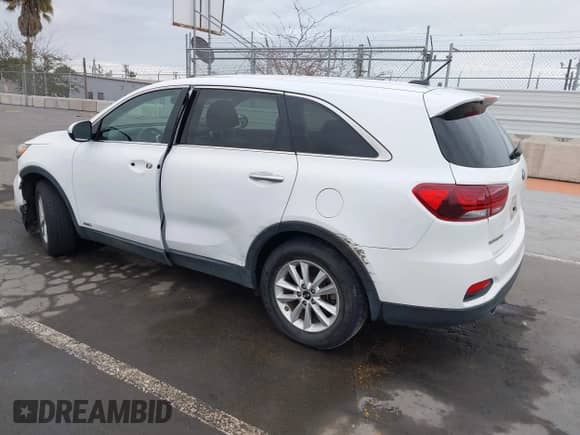 2019 Kia Sorento LX with VIN 5XYPGDA53KG456969, listed as a IAAI auction lot 42057524 with 83,828 mi miles and . Bid and sale history available at DreamBid. Image 3.