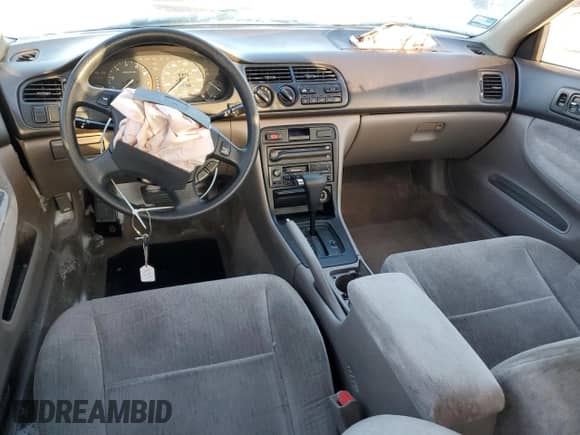 1995 Honda Accord LX z VIN 1HGCD5633SA075239, wystawiony jako Copart lot #41386425 z przebiegiem 244 611 mil mil oraz Szkoda całkowita • Salvage title. Historia ofert i sprzedaży dostępna na DreamBid. Obrazek 8.