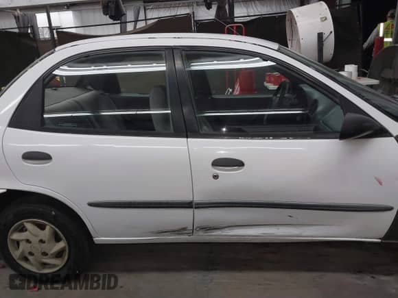 2001 Chevrolet Metro Lsi z VIN 2C1MR522816702155, wystawiony jako IAAI lot #41829889 z przebiegiem 162 769 mil mil oraz . Historia ofert i sprzedaży dostępna na DreamBid. Obrazek 13.