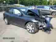 2024 Tesla Model Y Long Range with VIN 7SAYGDEE0RA248628, listed as a Copart auction lot 68287814 with Not provided miles and Salvage title. Bid and sale history available at DreamBid. Image 4.