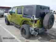 2007 Jeep Wrangler Unlimited Sahara z VIN 1J8GA59167L161894, wystawiony jako IAAI lot #41856064 z przebiegiem 122 714 mil mil oraz . Historia ofert i sprzedaży dostępna na DreamBid. Obrazek 3.
