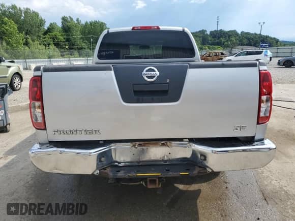 2007 Nissan Frontier SE z VIN 1N6AD09U87C456591, wystawiony jako Copart lot #63693815 z przebiegiem 209 159 mil mil oraz Szkoda całkowita • Salvage title. Historia ofert i sprzedaży dostępna na DreamBid. Obrazek 6.