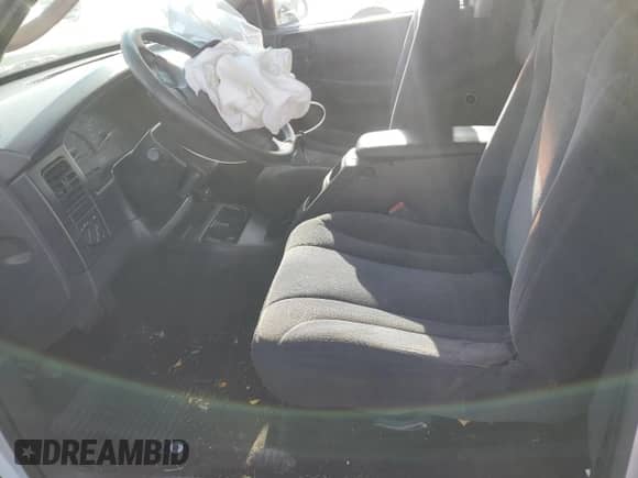 2003 Dodge Dakota z VIN 1D7FL16XX3S353971, wystawiony jako Copart lot #77018554 z przebiegiem Nie podano mil oraz Szkoda całkowita • Salvage title. Historia ofert i sprzedaży dostępna na DreamBid. Obrazek 7.