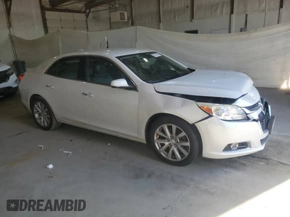 2015 Chevrolet Malibu LTZ with VIN 1G11F5SLXFF325907, listed as a Copart auction lot 85740195 with 136,763 mi miles and Salvage title. Bid and sale history available at DreamBid. Image 4.