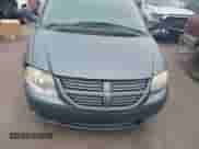 2006 Dodge Caravan SXT with VIN 1D4GP45R56B601994, listed as a IAAI auction lot 42856007 with 259,165 mi miles and . Bid and sale history available at DreamBid. Image 6.