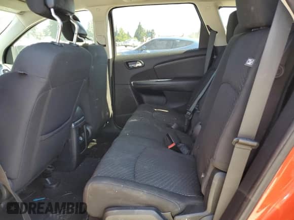 2018 Dodge Journey SXT z VIN 3C4PDDBG7JT390779, wystawiony jako Copart lot #61039765 z przebiegiem 124 969 mil mil oraz Szkoda całkowita • Salvage title. Historia ofert i sprzedaży dostępna na DreamBid. Obrazek 11.