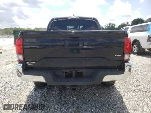 2023 Toyota Tacoma SR5 z VIN 3TMAZ5CN9PM213146, wystawiony jako Copart lot #64479895 z przebiegiem 28 057 mil mil oraz Szkoda całkowita • Salvage title. Historia ofert i sprzedaży dostępna na DreamBid. Obrazek 6.