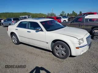 2005 Chrysler 300 300C AWD with VIN 2C3AK63H65H662076, listed as a IAAI auction lot 43428404 with 92,200 mi miles and . Bid and sale history available at DreamBid. Image 1.