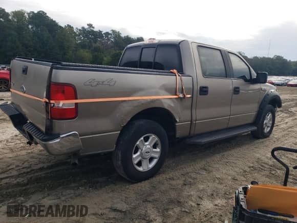 2004 Ford F-150 XLT with VIN 1FTPW145X4KC14691, listed as a Copart auction lot 83791905 with 93,533 mi miles and Salvage title. Bid and sale history available at DreamBid. Image 3.