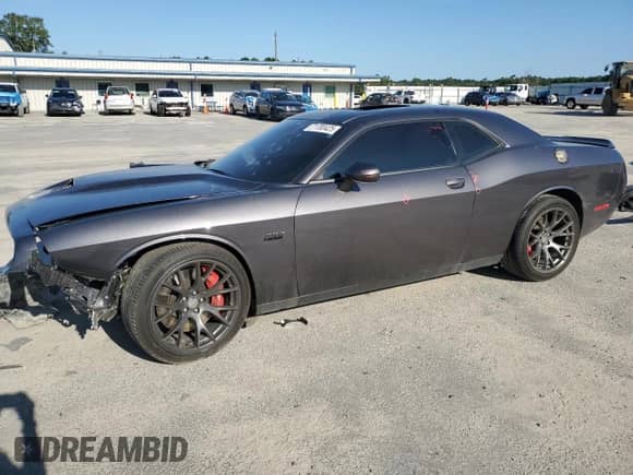 2015 Dodge Challenger SRT 392 with VIN 2C3CDZDJ4FH809650, listed as a Copart auction lot 71700425 with 111,922 mi miles and Salvage title. Bid and sale history available at DreamBid. Image 1.
