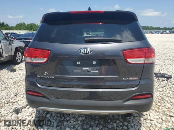 2018 Kia Sorento EX with VIN 5XYPHDA1XJG354979, listed as a Copart auction lot 62691784 with 98,671 mi miles and Clean title. Bid and sale history available at DreamBid. Image 6.