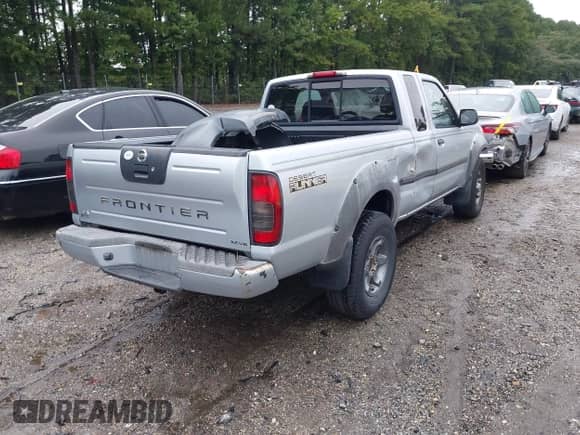 2002 Nissan Frontier XE with VIN 1N6ED26T82C316428, listed as a IAAI auction lot 43193106 with 184,919 mi miles and . Bid and sale history available at DreamBid. Image 4.