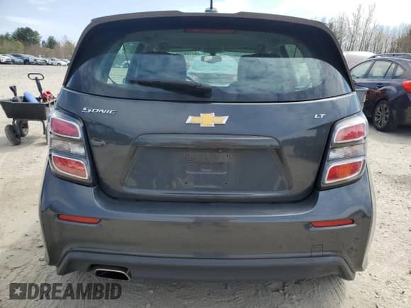 2017 Chevrolet Sonic LT z VIN 1G1JD6SH9H4144741, wystawiony jako Copart lot #54108275 z przebiegiem 142 547 mil mil oraz Czysty tytuł • Clean title. Historia ofert i sprzedaży dostępna na DreamBid. Obrazek 6.