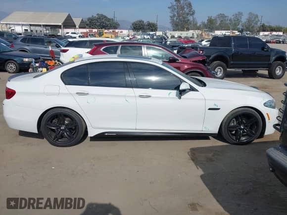 2016 BMW 5 Series 535i with VIN WBA5B1C54GG554086, listed as a IAAI auction lot 42910383 with 107,203 mi miles and . Bid and sale history available at DreamBid. Image 13.