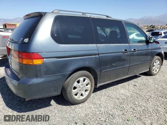 2004 Honda Odyssey EX с VIN 5FNRL186X4B108663, выставлен на аукционе Copart как лот 84861885 с пробегом 245 400 миль миль и Чистый • Clean title. История ставок и продаж доступна на DreamBid. Изображение 3.